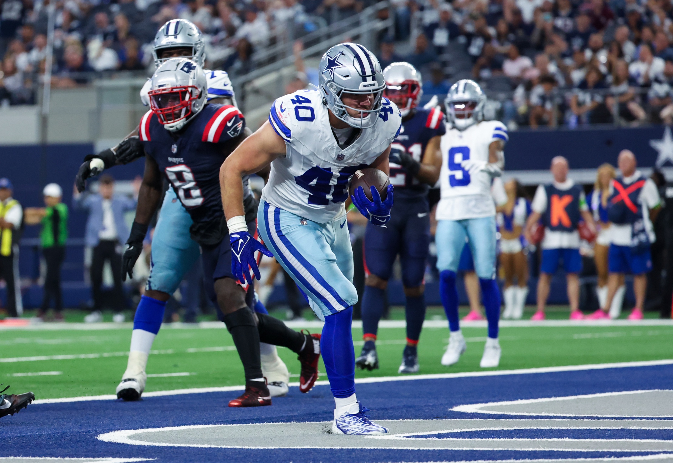 Oct 1, 2023; Arlington, Texas, USA; Dallas Cowboys running back Hunter Luepke (40) scores a touchdown during the second half against the New England Patriots at AT&T Stadium.